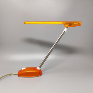 1990s Gorgeous Orange Table Lamp "Microlight" by Ernesto Gismondi for Artemide. Made in Italy Madinteriorart by Maden